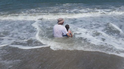 Jim spending time on the beaches of Panama with his daughter.