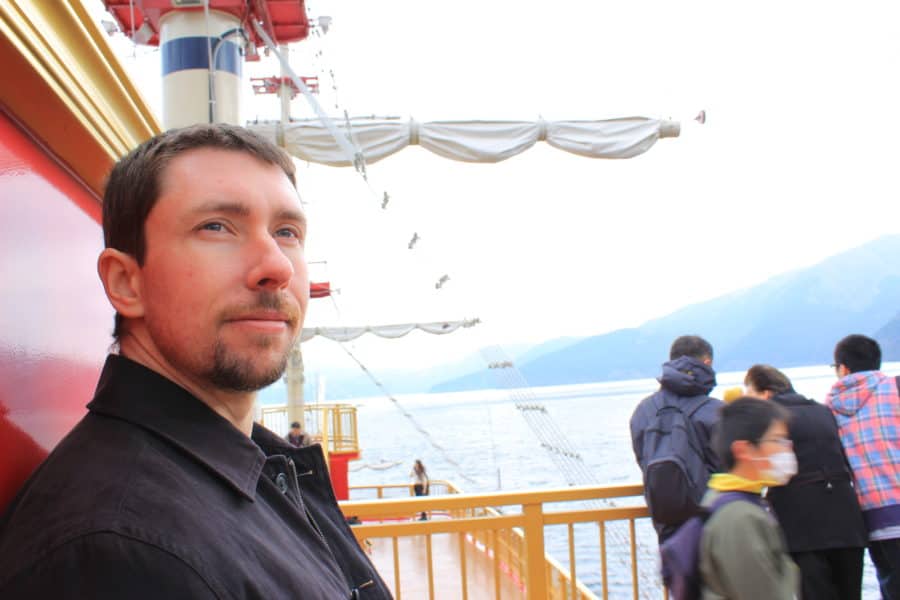 Adam on a boat near Hakone